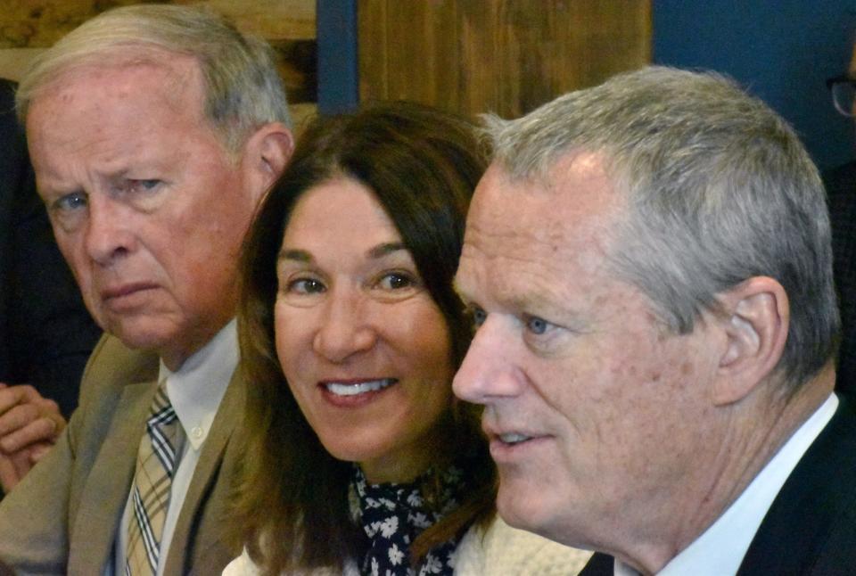 Fall River Mayor Paul Coogan, Lieutenant Governor Karyn Polito and Governor Charlie Baker listen to students talk about the school's early college program at Durfee Monday.