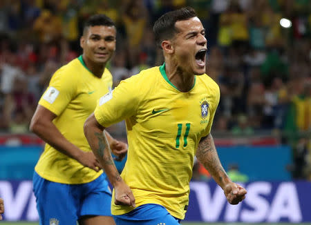 Soccer Football - World Cup - Group E - Brazil vs Switzerland - Rostov Arena, Rostov-on-Don, Russia - June 17, 2018 Brazil's Philippe Coutinho celebrates scoring their first goal REUTERS/Marko Djurica