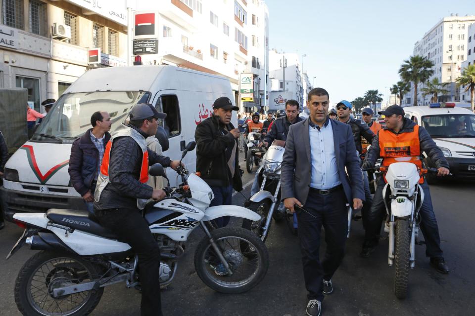 This Saturday April 26, 2014 photo shows Moroccan police officers conducting an operation against criminals, in Casablanca, Morocco. As home to most of Morocco’s economy, as well as most its slums, Casablanca in particular has always had a crime problem. It is a city of extremes, with skyscrapers and highend nightlife on one hand and the other the crushing poverty that spawned the angry youth who killed 33 people in a spate of bombings in 2003.(AP Photo / Abdeljalil Bounhar)