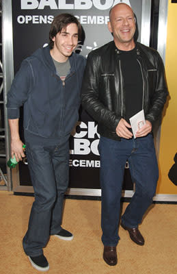 Justin Long and Bruce Willis at the Hollywood premiere of MGM's Rocky Balboa