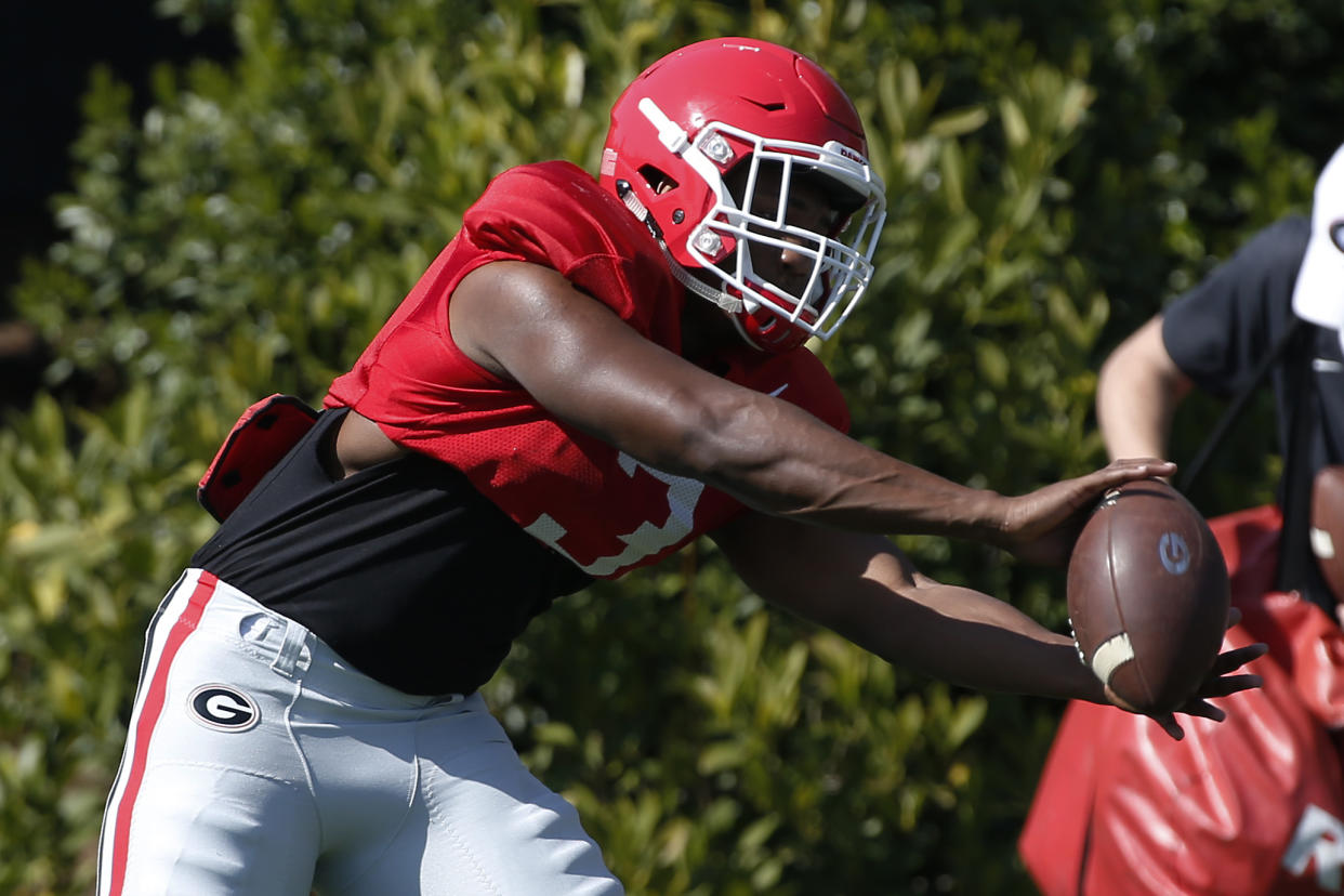 Georgia running back Zamir White (3) catches the ball during spring NCAA college football practice in Athens, Ga., Thursday, April 12, 2018. (Joshua L. Jones/Athens Banner-Herald via AP)