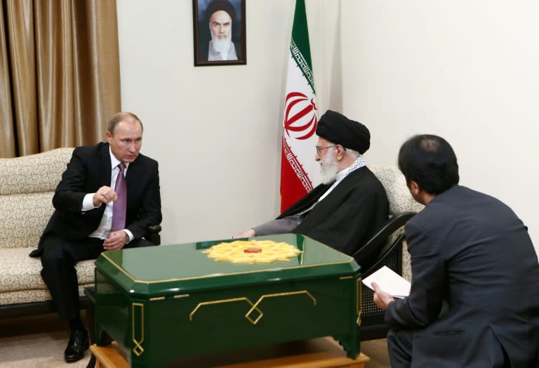 Iran's supreme leader Ayatollah Ali Khamenei (centre) holds talks with Russian President Vladimir Putin in Tehran on November 23, 2015