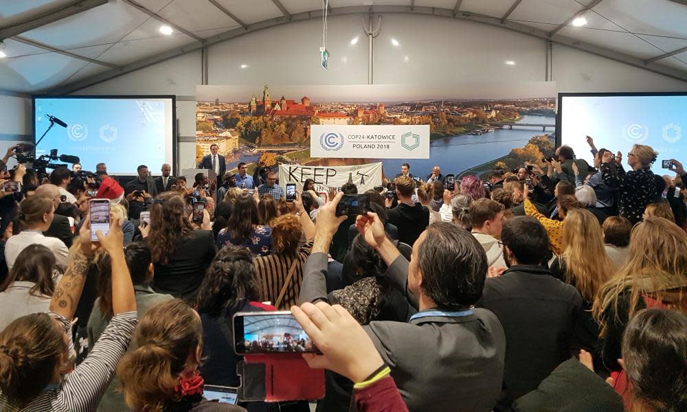 Protesters at the US-hosted event at the UN climate talks in Katowice, Poland.