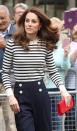 <p>The Duchess of Cambridge chose a nautical look for this morning's launch of the King's Cup. She paired a striped shirt with sailor-inspired trousers and a bright red handbag. </p>