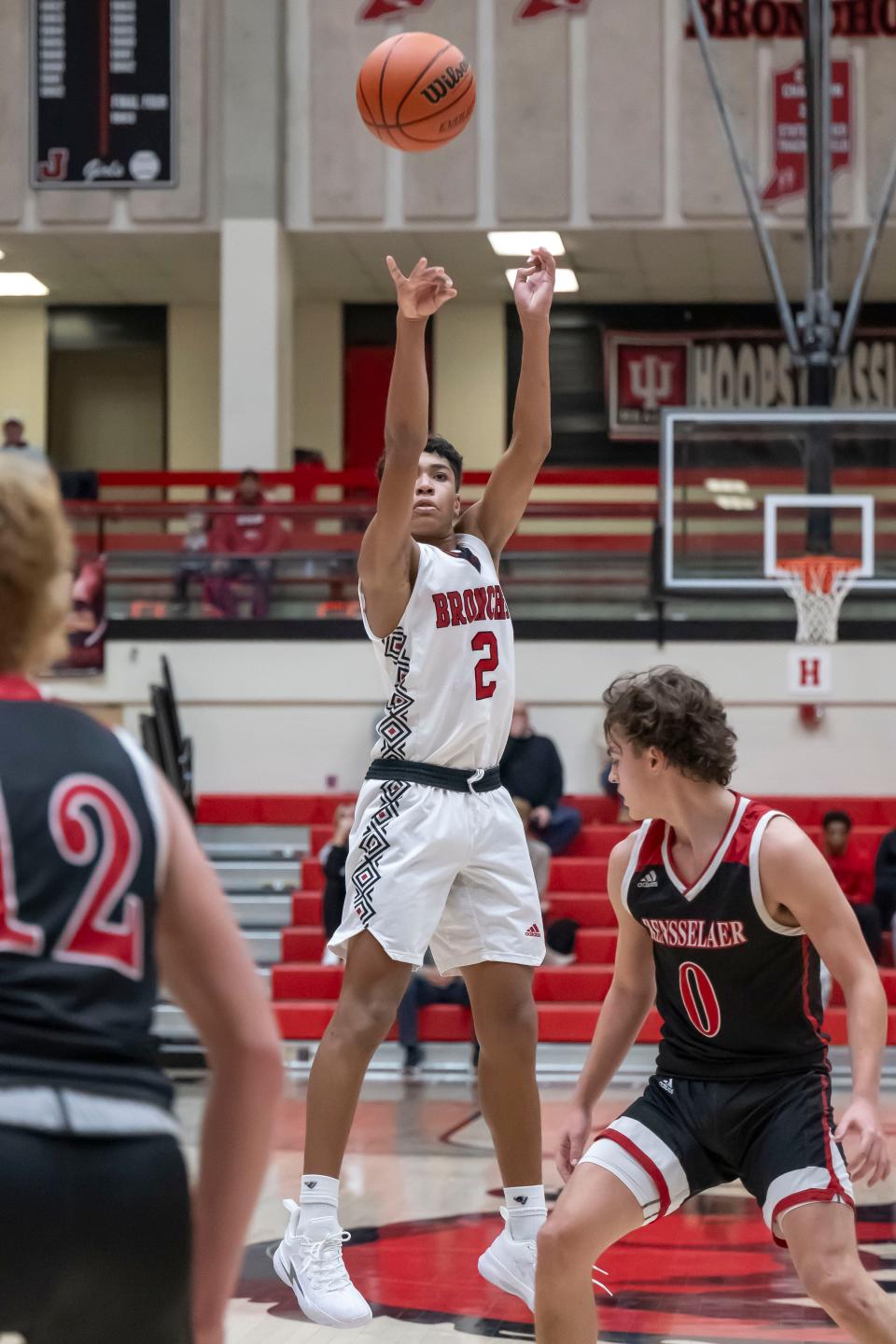Lafayette Jefferson junior Alonzo Clawson-Smith (2) nails a three during the IU Health Hoops Classic basketball 3rd place game, Lafayette Jefferson vs Rensselaer Central, Saturday, Dec. 2, 2023, at Crawley Center in Lafayette, Ind. Lafayette Jefferson won 66-28.