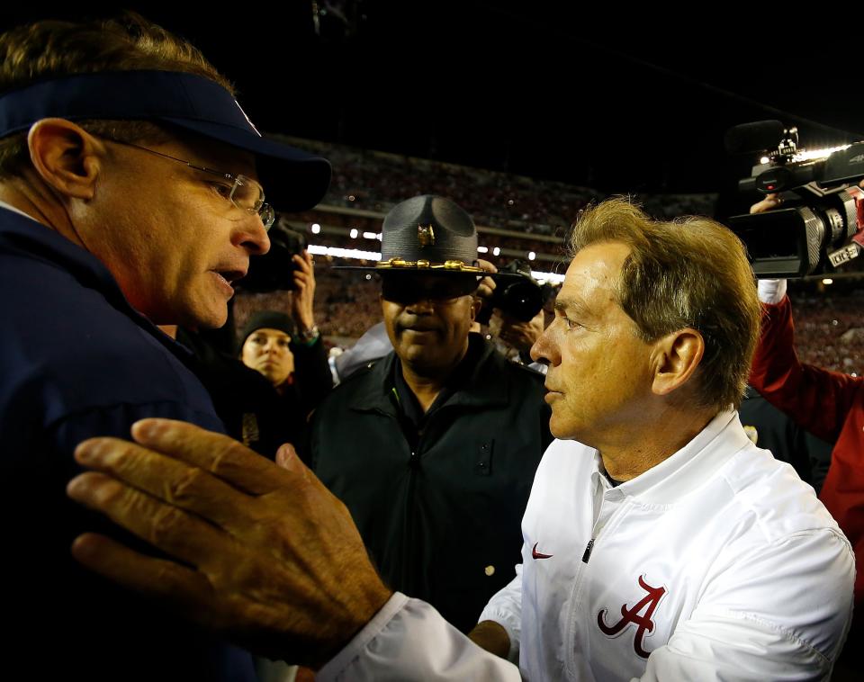 Will Alabama’s Nick Saban be celebrating another win over Auburn’s Gus Malzahn on Saturday? (Getty)