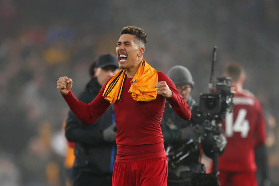 WOLVERHAMPTON, ENGLAND - JANUARY 23:  Roberto Firmino of Liverpool celebrates victory after the Premier League match between Wolverhampton Wanderers and Liverpool FC at Molineux on January 23, 2020 in Wolverhampton, United Kingdom. (Photo by Catherine Ivill/Getty Images)