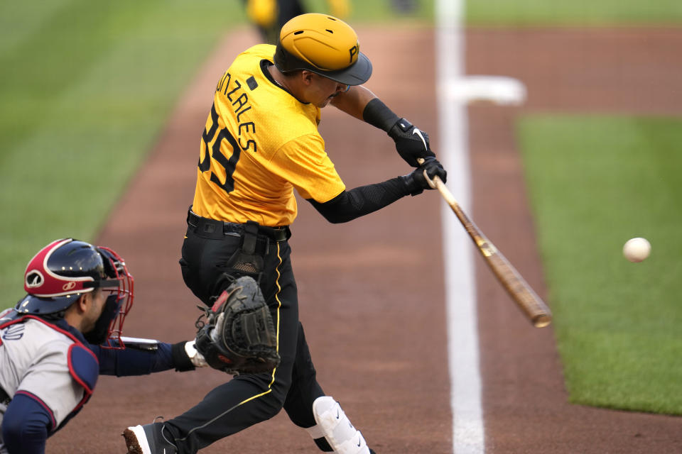 Pittsburgh Pirates' Nick Gonzales (39) hits a two-run single off Atlanta Braves starting pitcher Ray Kerr during the first inning of a baseball game in Pittsburgh, Friday, May 24, 2024. (AP Photo/Gene J. Puskar)