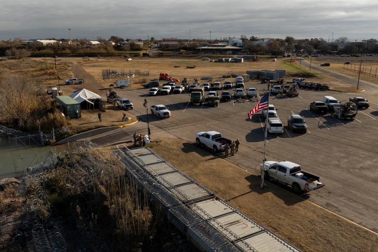 In an aerial view, Texas law enforcement's staging ground for military equipment and National Guard soldiers is seen at Shelby Park on Jan. 26, 2024 in Eagle Pass, Texas.
