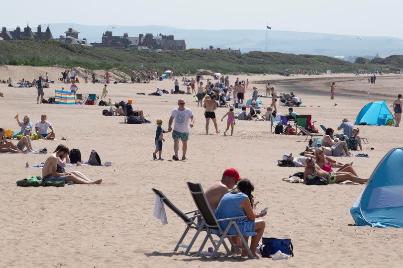 WEATHER TROON SCOTLAND Pictured is general Hot Weather scenes at Troon beach in Scotland as temperatures reach 28 degrees. Pic Ross Turpie / Daily Record Sunday Mail Reach PLC -Credit:Ross Turpie / Daily Record