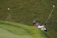 Team Europe's Ian Poulter hits from a bunker on the sixth hole during a practice day at the Ryder Cup at the Whistling Straits Golf Course Wednesday, Sept. 22, 2021, in Sheboygan, Wis. (AP Photo/Jeff Roberson)