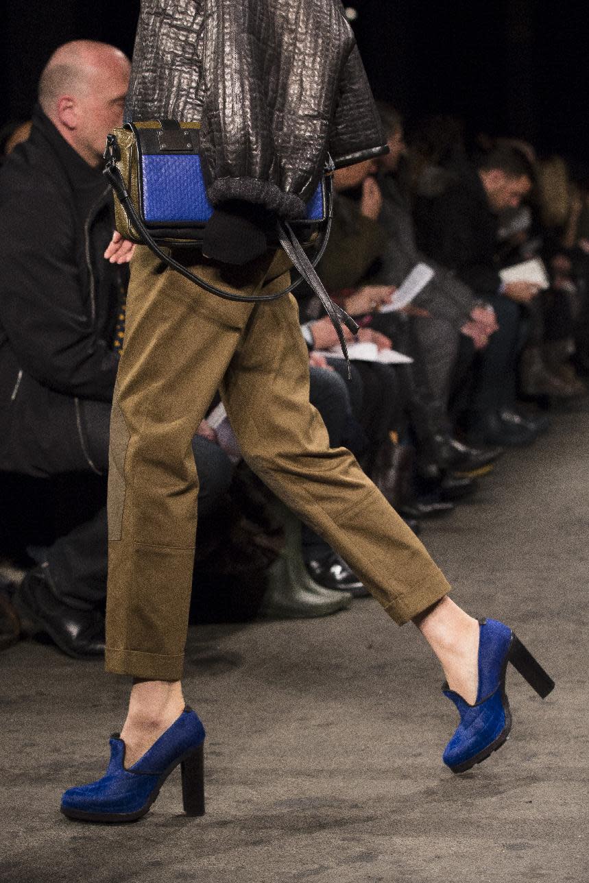 A model walks the runway at the presentation of the Rag & Bone Fall 2013 fashion collection during Fashion Week, Friday, Feb. 8, 2013, in New York. (AP Photo/John Minchillo)