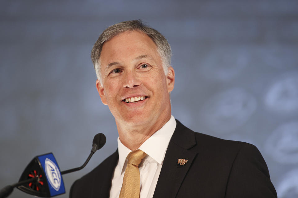 FILE - Wake Forest head coach Dave Clawson answers a question during an NCAA college football news conference at the Atlantic Coast Conference media days in Charlotte, N.C., in this Thursday, July 22, 2021, file photo. (AP Photo/Nell Redmond, File)