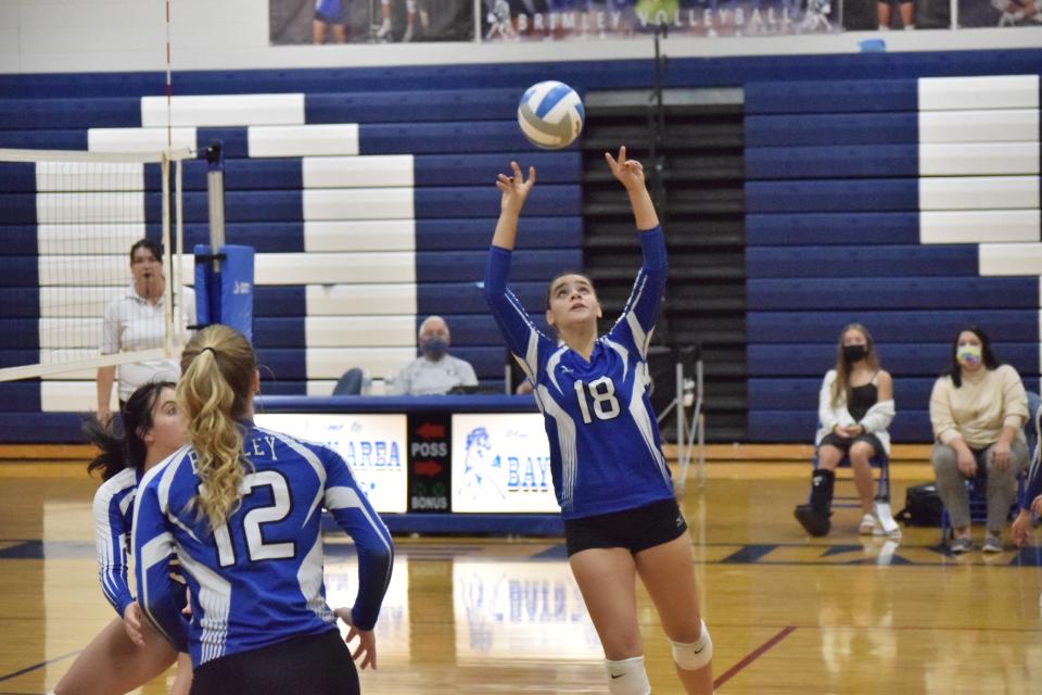 Brimley's Lindsey Hill (18) sets during a home volleyball match against Newberry. Hill will be testing her skills against international competition in July, when she will travel to Barcelona with other America's Team athletes.