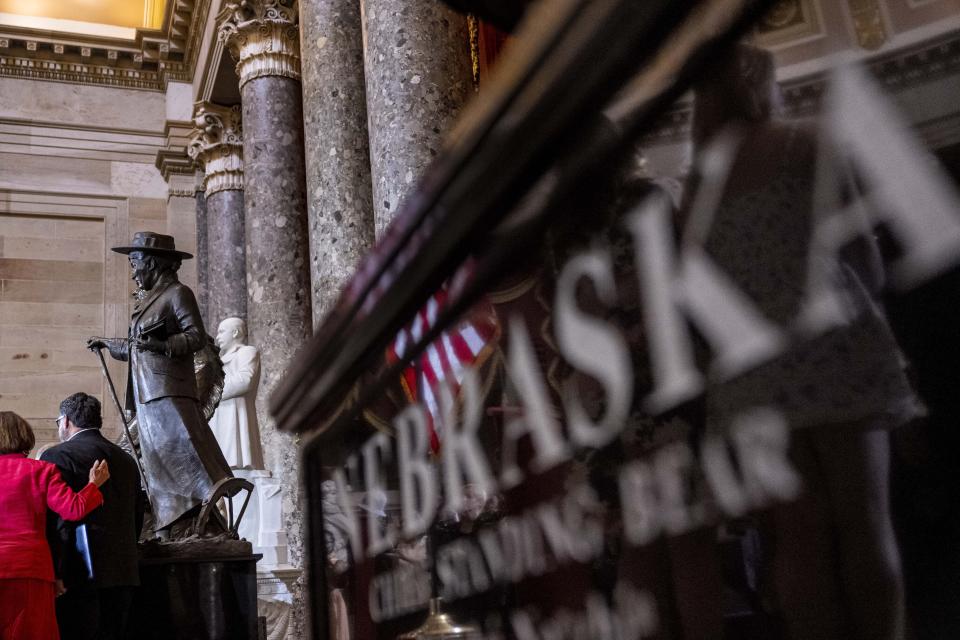 The Congressional statue of Willa Cather is unveiled in Statuary Hall on Capitol Hill in Washington, Wednesday, June 7, 2023. Willa Cather was one of the country's most beloved authors, writing about the Great Plains and the spirit of America. (AP Photo/Andrew Harnik)