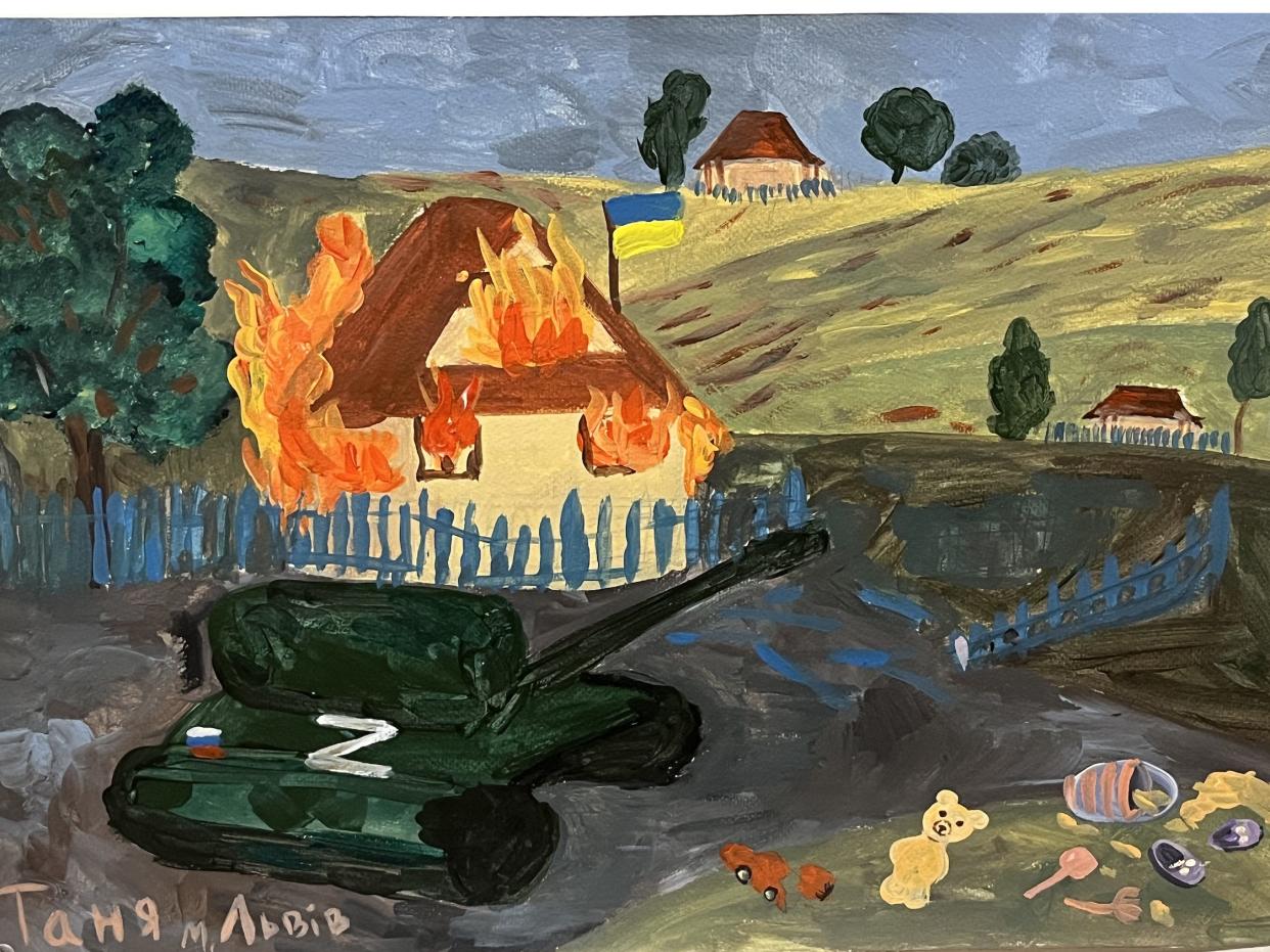 A Ukrainian child's artwork depicting a tank and a house on fire