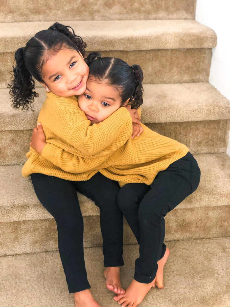 It's OK to say no! The McCoy daughters share an adorable hug.