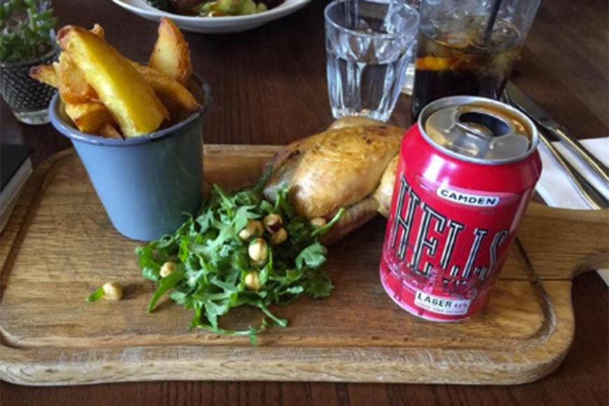 This funny restaurant decides to serve the food on a chopping board, they may have just run out of plates, and shortly after realised they didn't have anything to put the gravy in! Can of gravy it is!