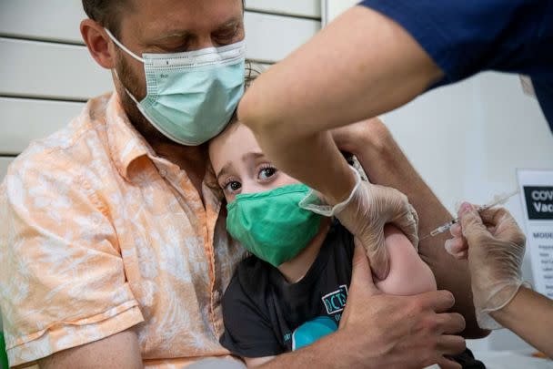 PHOTO: A healthcare worker administers a dose of the Moderna Covid-19 vaccine to a 3 year-old child at the Brooklyn Children's Museum vaccination site, serving children six months to 5-Years old, in New York, June 23, 2022.  (Bloomberg via Getty Images)