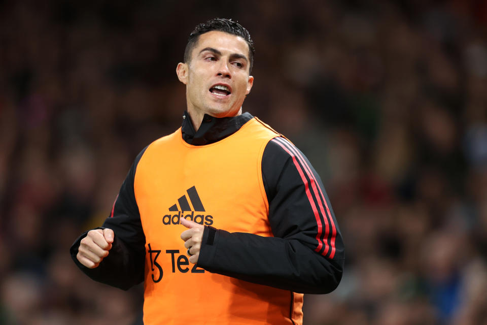 Seen here, Cristiano Ronaldo warms up on the sidelines during Manchester United's Premier League win over Tottenham at Old Trafford.