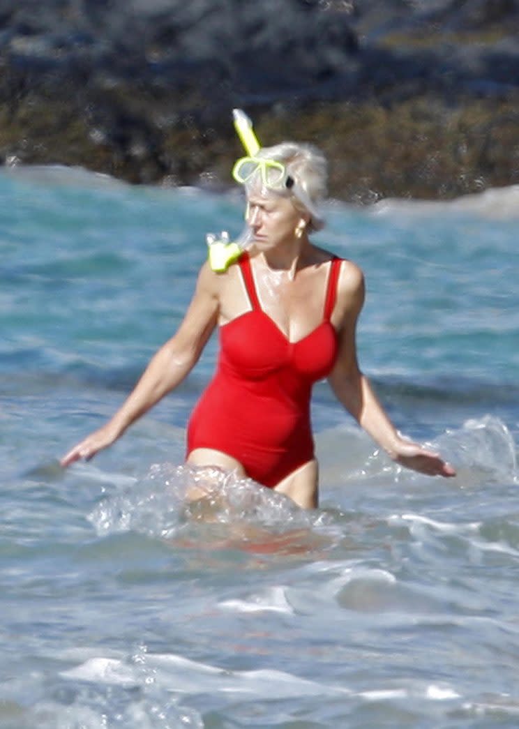 Actress Helen Mirren resting on the beach in Hawaii. Photo: Flynet