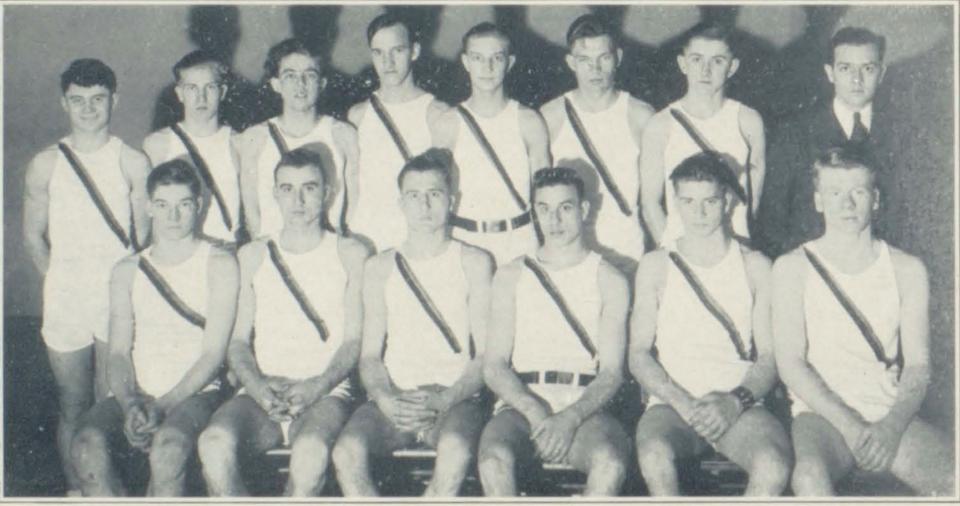 Charles W. Wilson, standing, second from right, was a member of the Tecumseh High School track team before he went on to become a U.S. Navy fighter pilot in World War II. He is pictured here in the team photo in the 1933 Tecumseh High School yearbook.