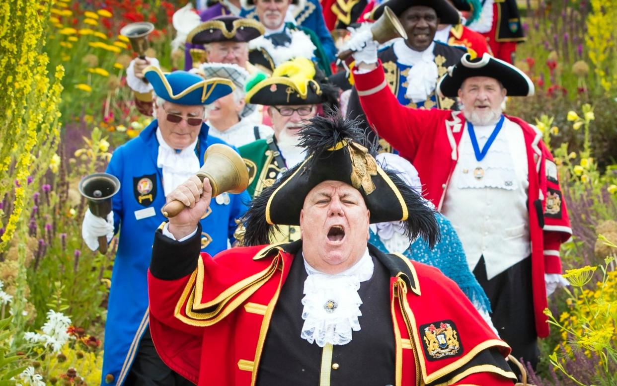 Participants during the Helmsley Invitational National Town Criers Competition for the Magna Carta Trophy, at the Helmsley Walled Garden at Helmsley Castle in the North York Moors National Park. PRESS ASSOCIATION Photo. Issue date: Saturday July 21, 2018. The competition for the Magna Carta TrophyÕ will see at least 20 official town criers representing their towns from across the country and internationally, competing before a panel of specially selected judges to the rules of the Ancient and Honourable Guild of Town Criers. Photo credit should read: Danny Lawson/PA Wire - : Danny Lawson/PA Wire/: Danny Lawson/PA Wire