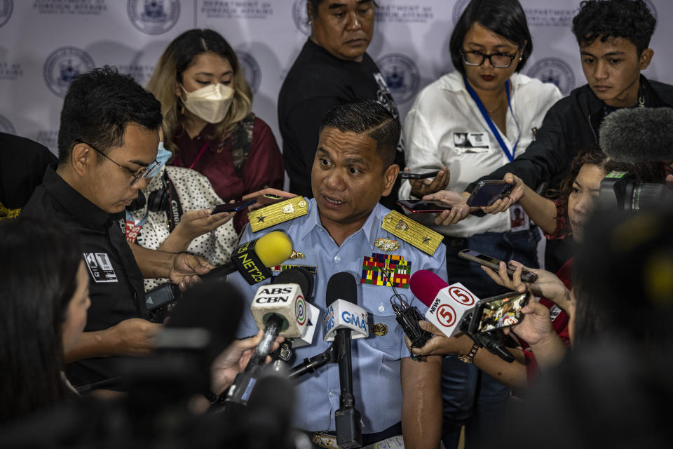 Commodore Jay Tarriela, Philippine Coast Guard spokesperson for the West Philippine Sea, answers questions from reporters after a press conference on the recent actions by the Chinese Coast Guard against Philippine vessels in the South China Sea, at the Philippine Department of Foreign Affairs in Manila, Philippines on Monday, Aug. 7, 2023. The Philippine government summoned the Chinese ambassador on Monday to convey a diplomatic protest over the Chinese coast guard's use of a water cannon against a Filipino supply boat in the disputed South China Sea, a Philippine official said. (Ezra Acayan/Pool Photo via AP)