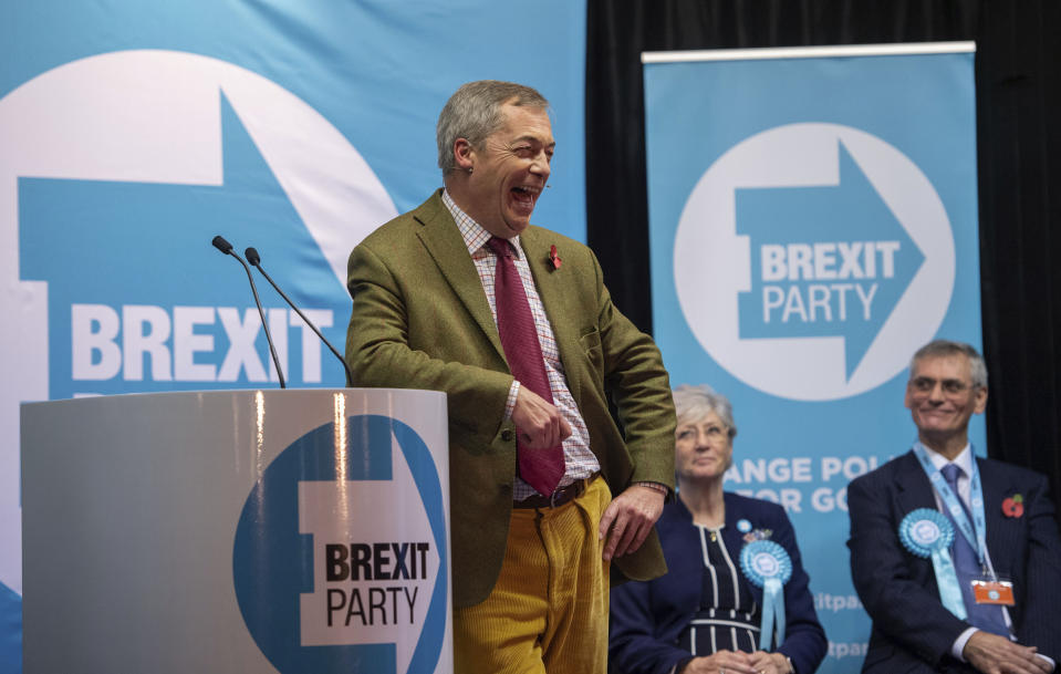 Brexit Party leader Nigel Farage reacts during a public rally at a miner's social club in Nottingham, England, Tuesday Nov. 5, 2019. Britain's Brexit split with Europe is one of the main issues as the country goes to the polls in a General Election on Dec. 12. (Joe Giddens/PA via AP)