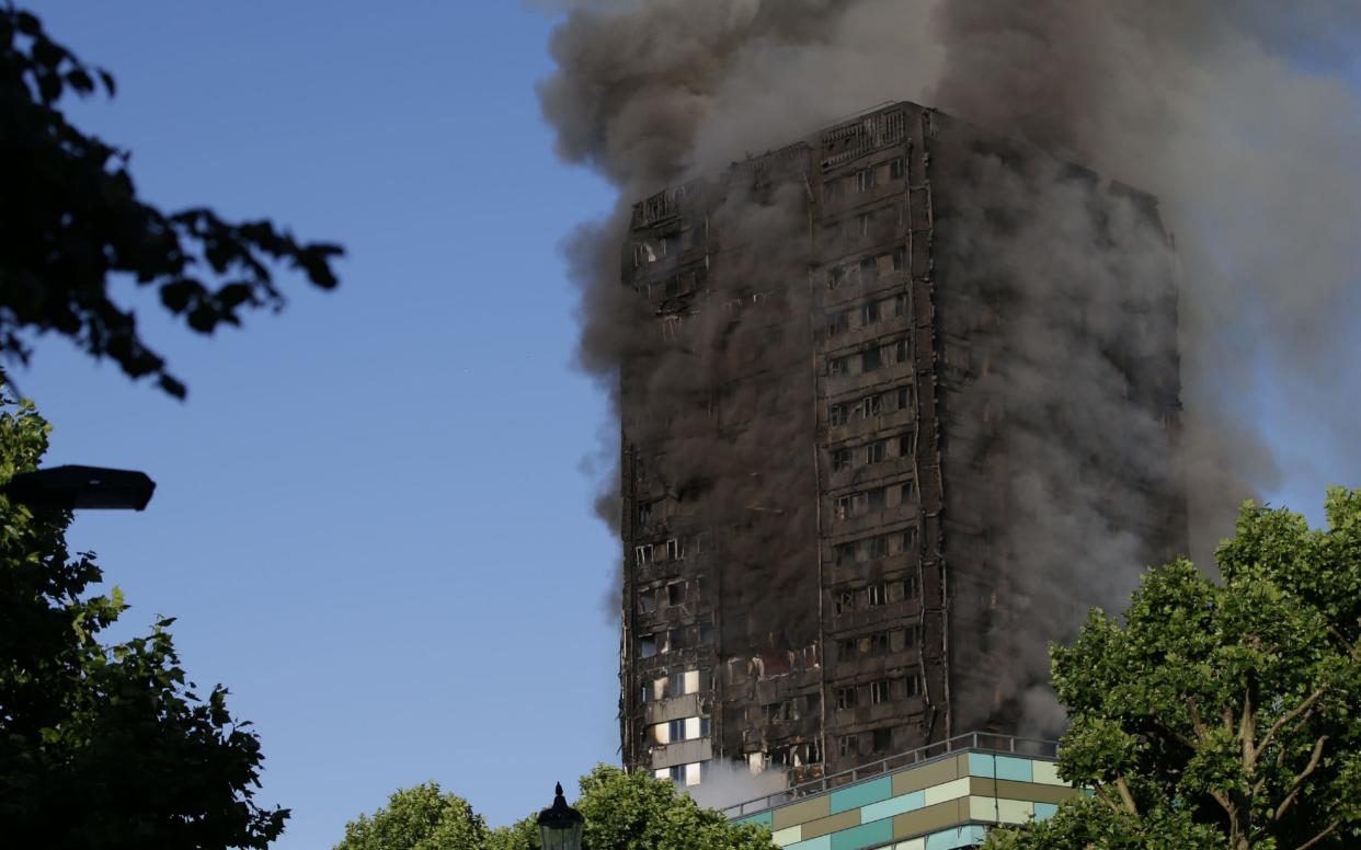 Smoke billows from Grenfell Tower  - AFP