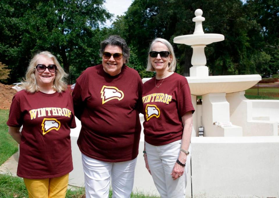 From left, Gail McLellan, Susan Swails and Debra Feitner stand in front of the new fountain at Winthrop University in Rock Hill, S.C.