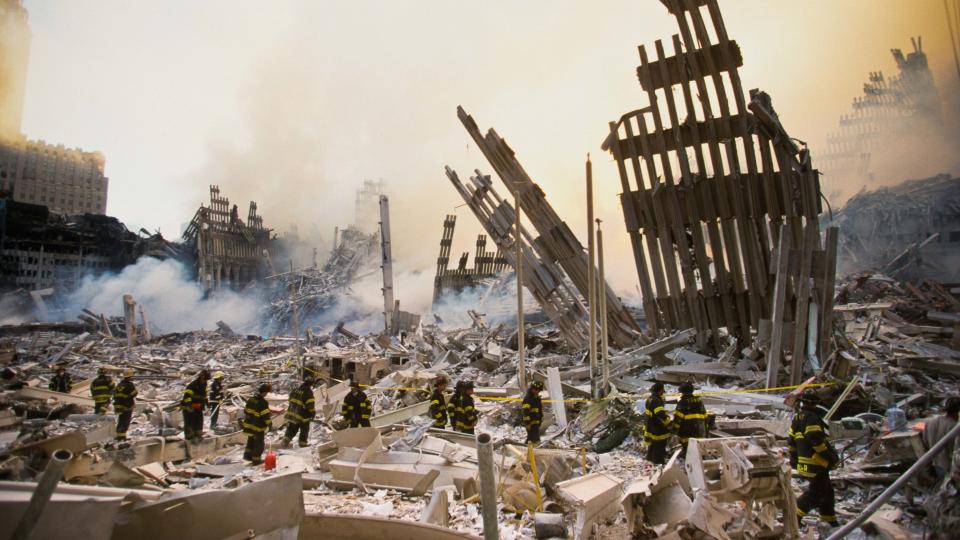 The rubble of the World Trade Center smoulders following a terrorist attack September 11, 2001 in New York. A hijacked plane crashed into and destroyed the landmark structure. (Photo by Porter Gifford/Corbis via Getty Images)