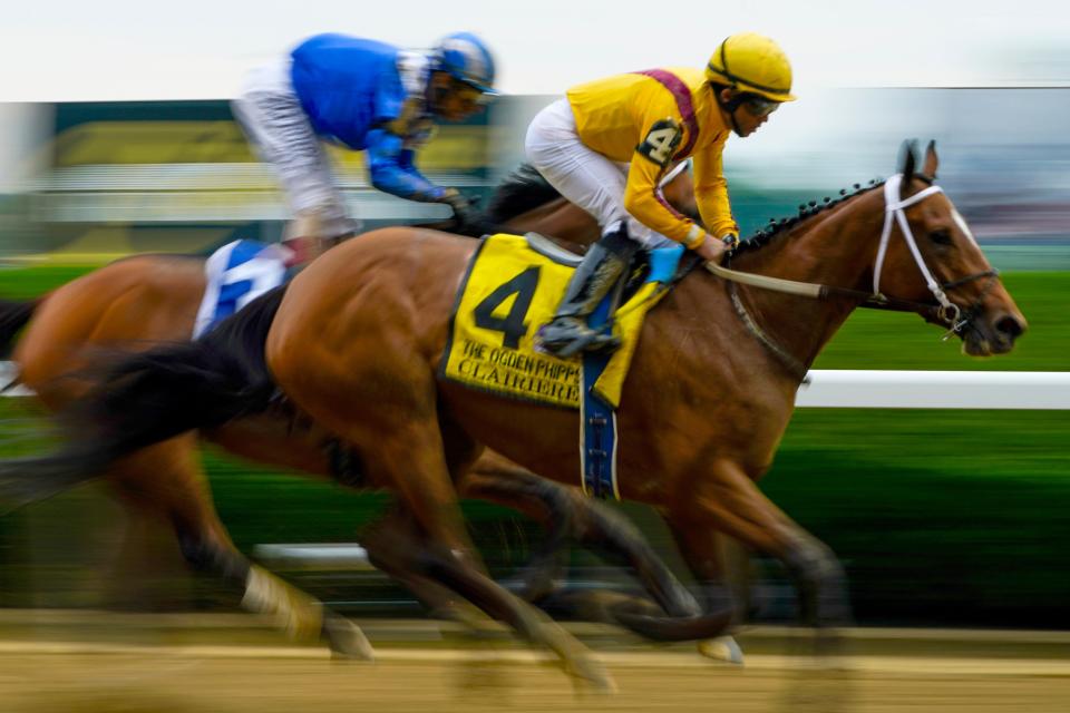 Clairiere (4), with jockey Joel Rosario up, wins The Ogden Phipps horse race before the 154th running of the Belmont Stakes horse race, Saturday, June 11, 2022, at Belmont Park in Elmont, N.Y.