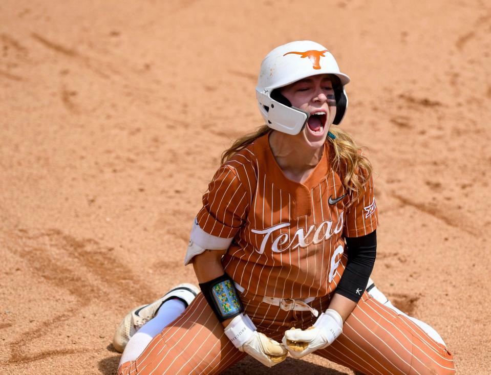 Texas’ Bella Dayton celebrates after reaching base safely against Oklahoma in the Longhorns' 2-1 win Sunday that clinched the series. Now ranked No. 2, Texas returns to action Wednesday against No. 25 Texas State before a three-game series with Baylor this weekend.