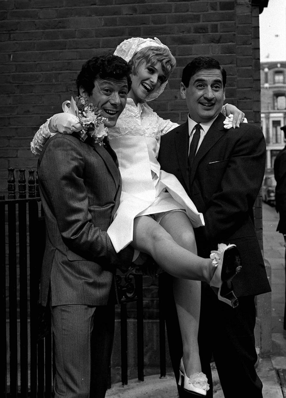 Lionel with his wife Susan and best man Bernie Winters on the day of their wedding at Kensington registry office, London (PA) (PA Archive)