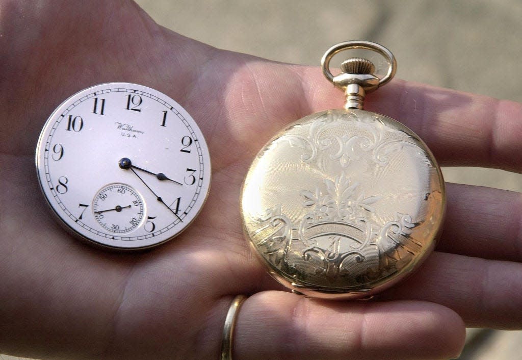 The gold plated pocket watch belonging to an ill fated passenger on the Titanic, which stopped as the ship sank in April 1912, which is to be auctioned along with other artifacts today by Henry Aldridge & Son at the British Titanic Society Convention, Southampton. *The item was rescued from the body of passenger John Gill, 24, from Somerset and is expected to fetch 25,000. (Photo by Tim Ockenden - PA Images/PA Images via Getty Images)