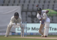 India's Mayank Agarwal plays shot during the day two of their second test cricket match with New Zealand in Mumbai, India, Saturday, Dec. 4, 2021.(AP Photo/Rafiq Maqbool)