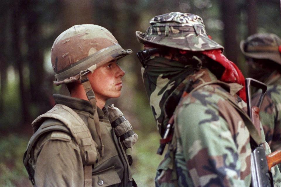 Canadian soldier Patrick Cloutier and Brad Laroque alias "Freddy Kruger" come face to face in a tense standoff at the Kanesatake reserve in Oka, Que., Saturday September 1, 1990. 