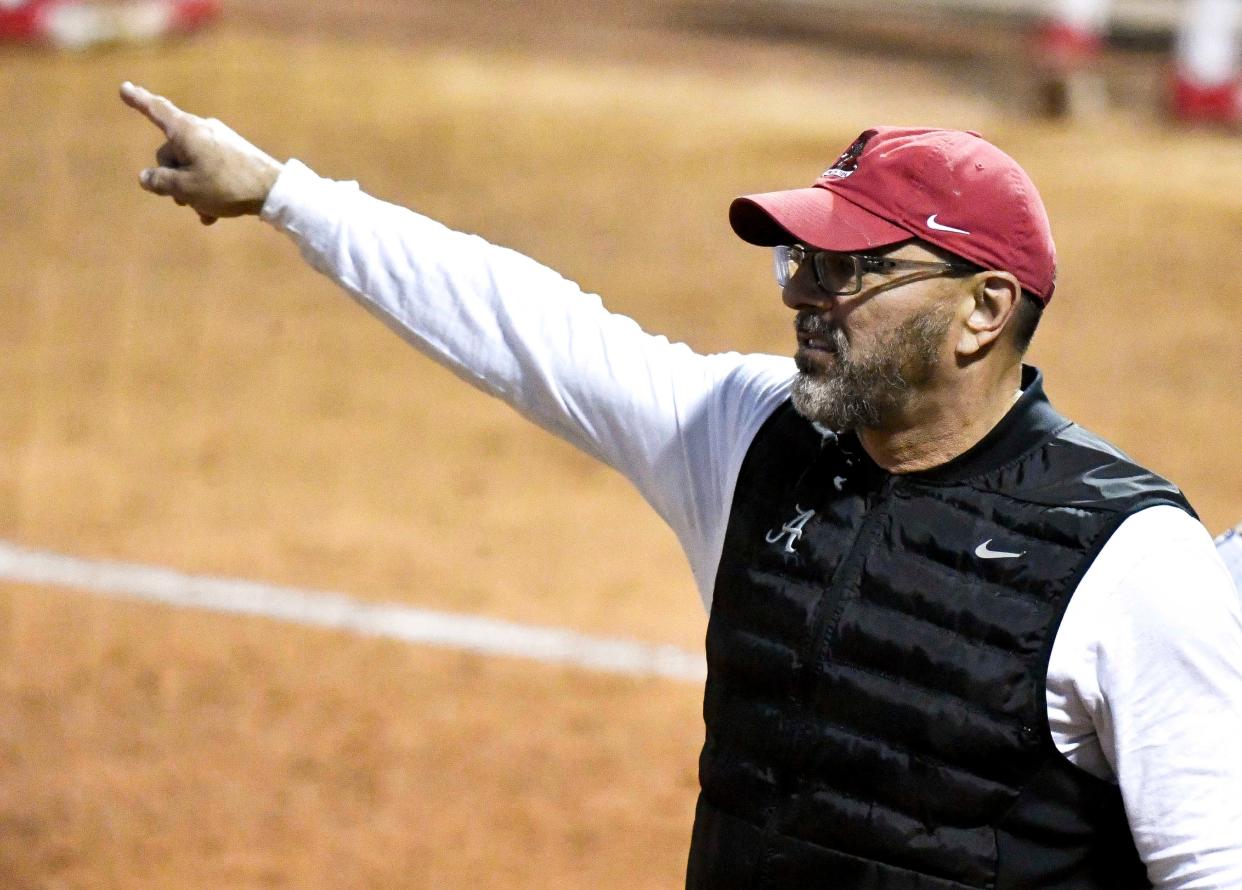 April r, 2024; Tuscaloosa, Alabama, USA; Alabama head coach Patrick Murphy gestures for a player to move in the field at Rhoads Stadium Friday. Alabama defeated Ole Miss 4-0 to open the weekend series.