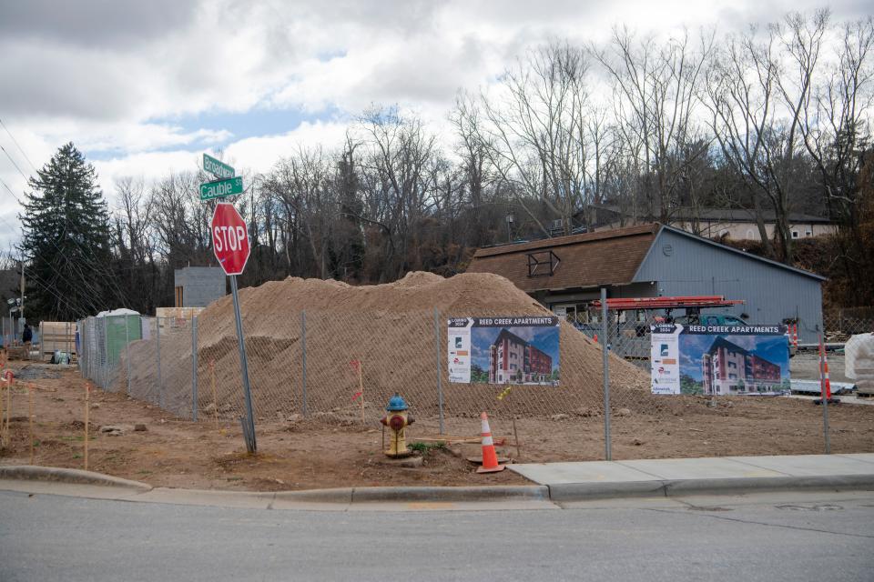 An Asheville Citizen Times reader asks about a development under construction off of Broadway Street.