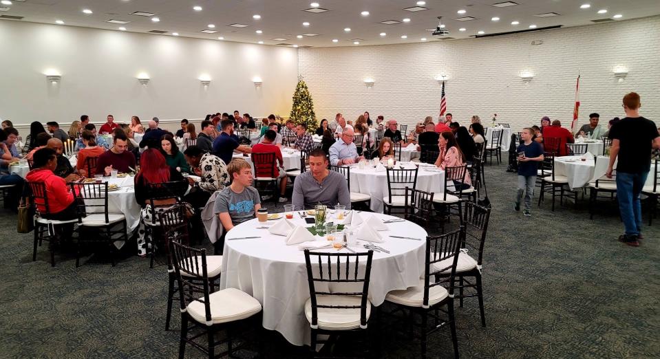 More than 150 local active-duty military personnel and their families and veterans got a Thanksgiving meal at The Island on Thursday, courtesy of Operation Holiday Cheer.