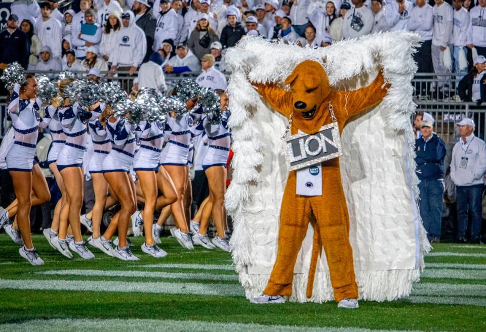 The Nittany Lion dances with a cape of white shakers for the White Out at Beaver Stadium on Saturday, Sept. 23, 2023.