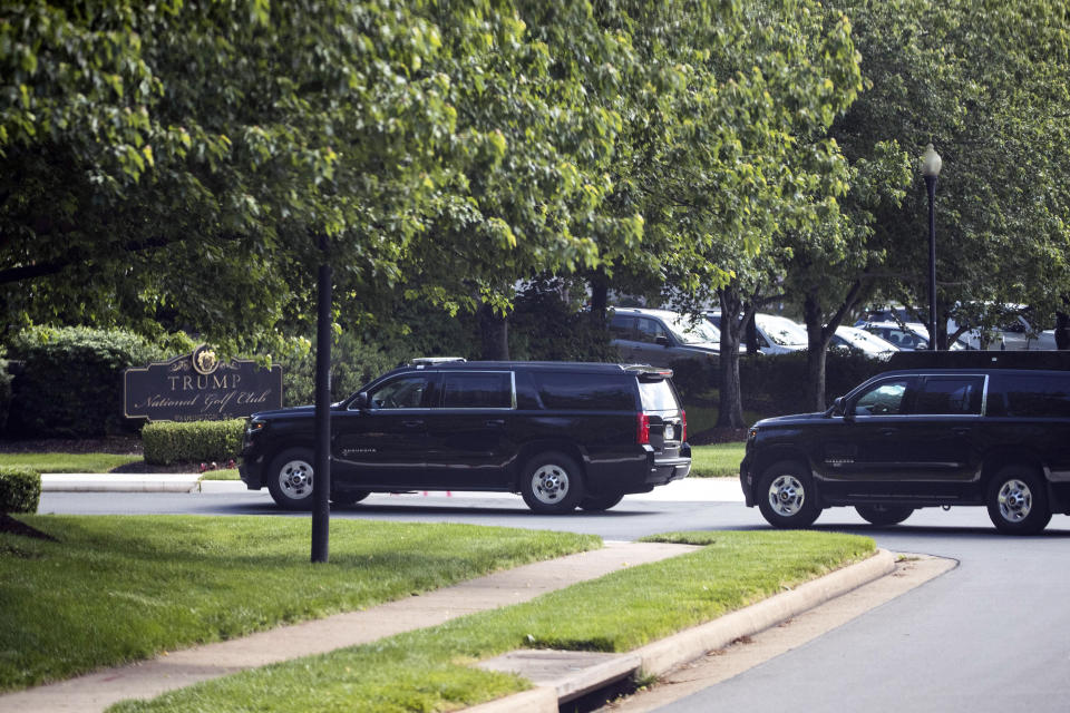 The motorcade for President Donald Trump arrives at Trump National Golf Club, Saturday, May 23, 2020, in Sterling, Va. (AP Photo/Alex Brandon)