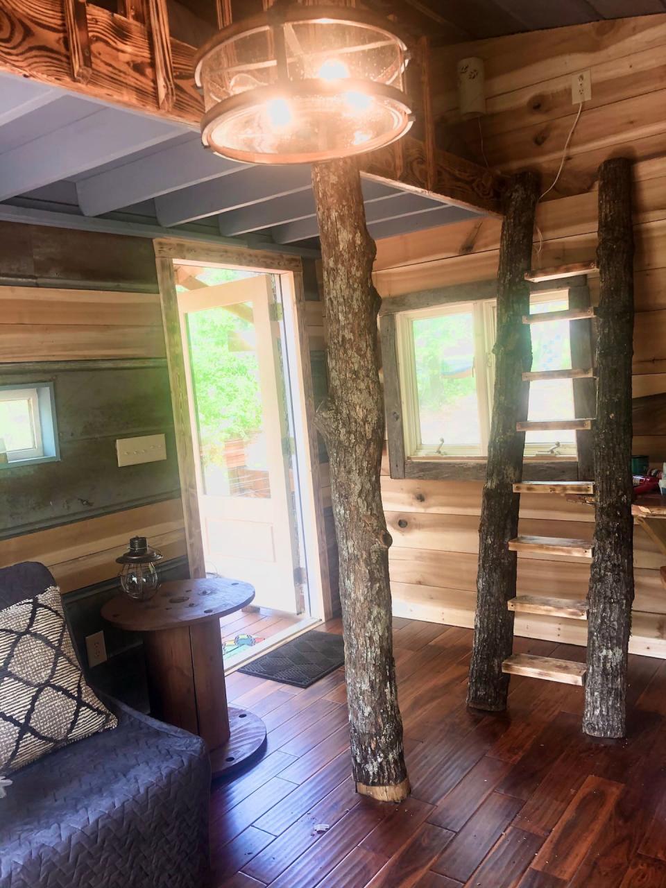 The ladder to one of the attic beds in Eli's Treehouse, North Carolina.