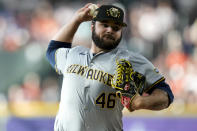 Milwaukee Brewers starting pitcher Bryse Wilson delivers against the Houston Astros during the first inning of a baseball game Saturday, May 18, 2024, in Houston. (AP Photo/Eric Christian Smith)
