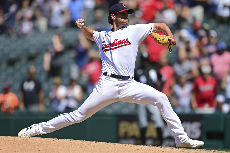 Cleveland Guardians starting pitcher Shane Bieber delivers in the ninth inning in the first baseball game of a doubleheader against the Chicago White Sox, Tuesday, July 12, 2022, in Cleveland. The Guardians won 4-1. (AP Photo/David Dermer)