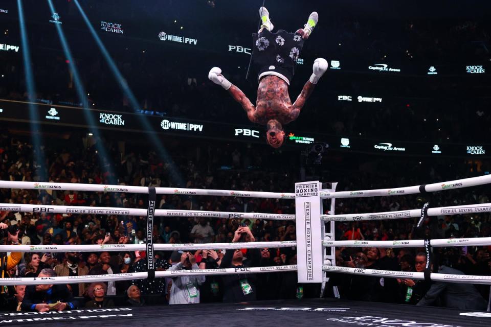 Davis celebrates his stoppage victory over Hector Luis Garcia in style (Getty)