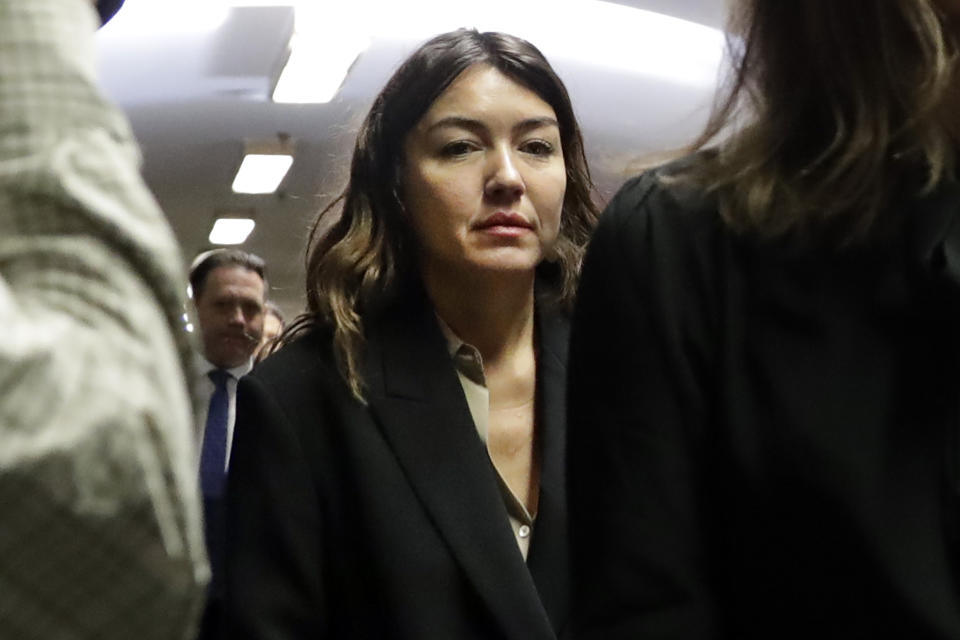 Miriam Haley arrives at court for Harvey Weinstein's sentencing, in New York, Wednesday, March 11, 2020. Weinstein faces a minimum of 5 years and a maximum of 29 years in prison for raping an aspiring actress in 2013 and forcibly performing oral sex on a TV and film production assistant in 2006. A second criminal case is pending in California. (AP Photo/Richard Drew)