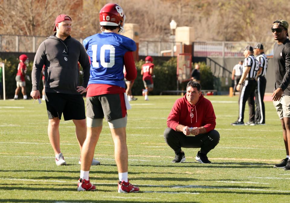 Seth Littrell works with players as the University of Oklahoma Sooners (OU) college football team holds spring practice outside of Gaylord Family/Oklahoma Memorial Stadium on  March 21, 2023 in Norman, Okla.  [Steve Sisney/For The Oklahoman]