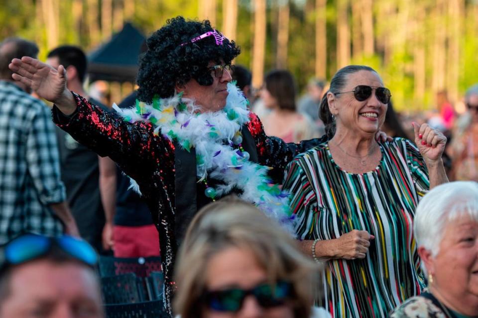 Fans dance before the start of the KC and The Sunshine Band concert at The Sound Amphitheater in Gautier on Friday, April 12, 2024. The show marks the multi-million dollar venue’s inaugural show. Hannah Ruhoff/Sun Herald